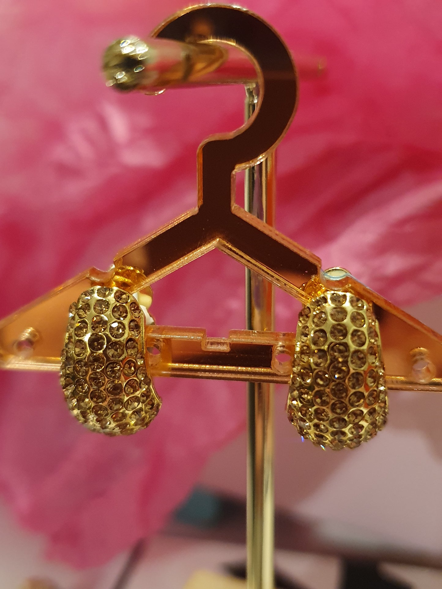 Demure Gold Clip On Earrings