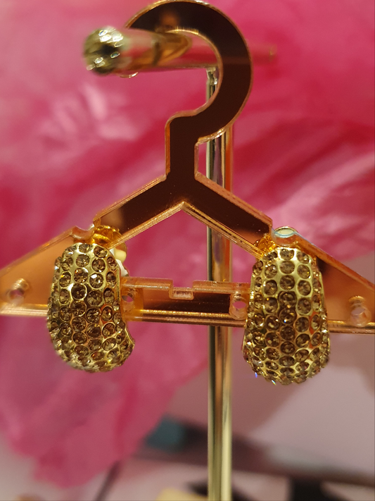 Demure Gold Clip On Earrings